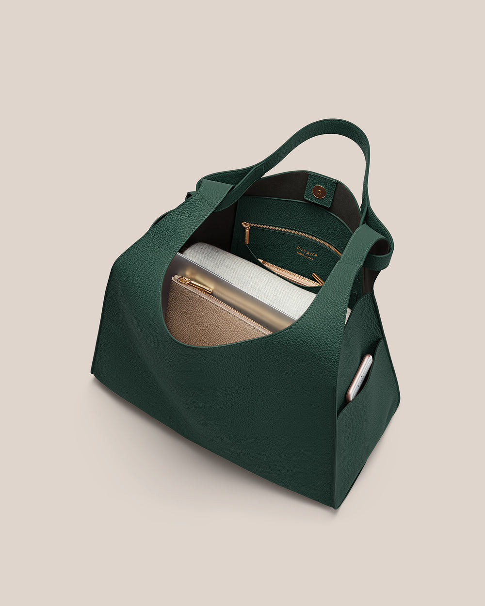 Open handbag with wallet and items inside.