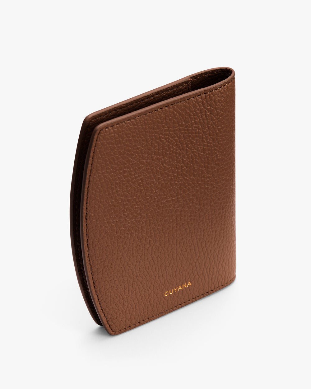 Textured wallet standing upright on a flat surface.