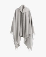 Cape with fringe detail displayed on a plain background.