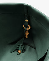 Interior of a bag with a key on a hook.