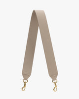 Wide strap with gold clips on both ends.
