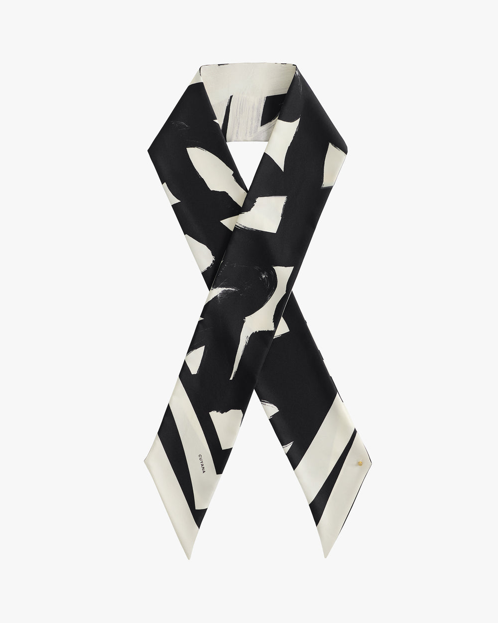 Silk scarf with abstract black and white pattern.