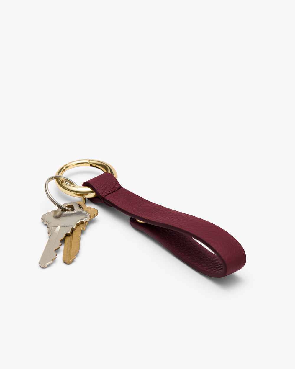 Keychain with leather strap and two keys attached