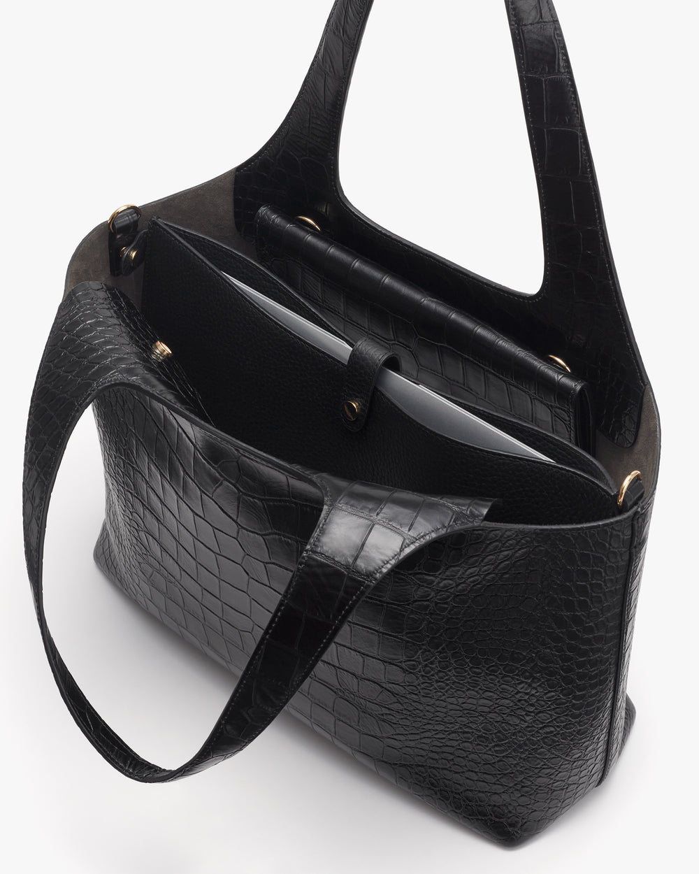 Tote bag with croc-embossed leather and open compartments.