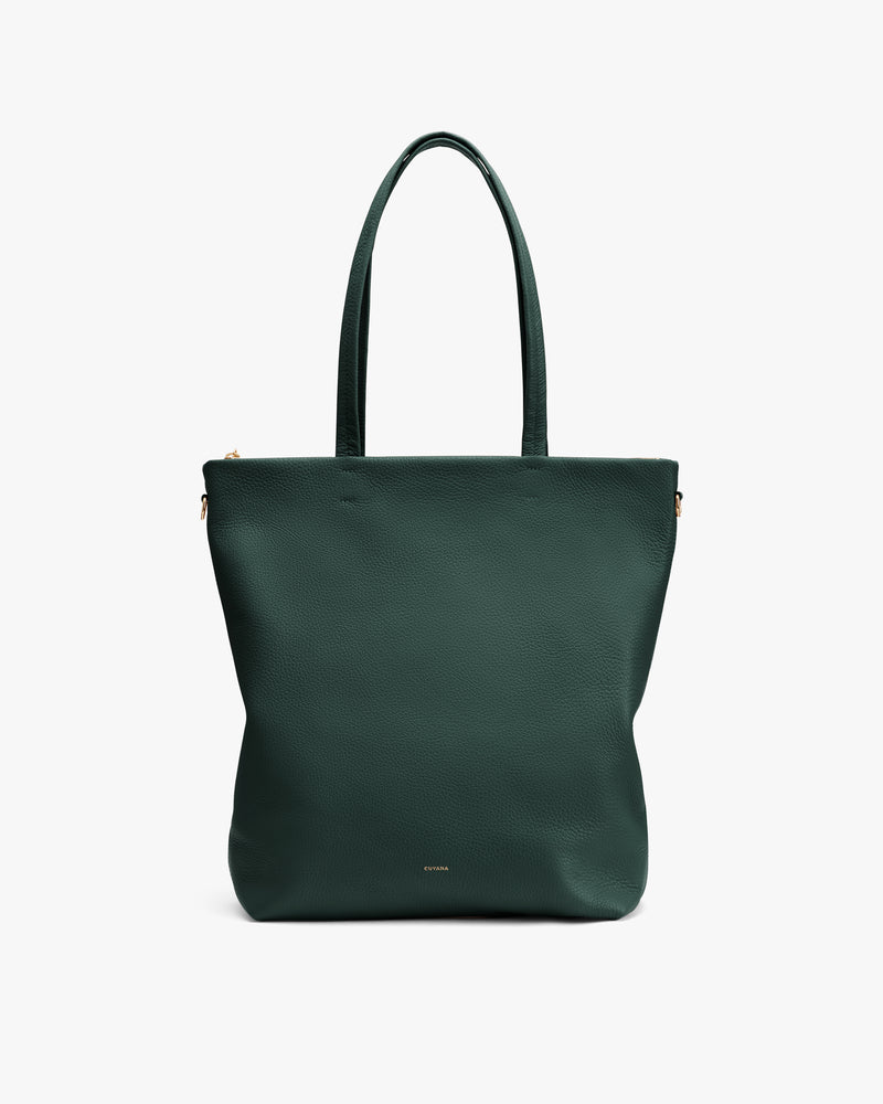 Tote bag with two handles viewed from the front against plain background.