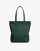 Tote bag with two handles viewed from the front against plain background.