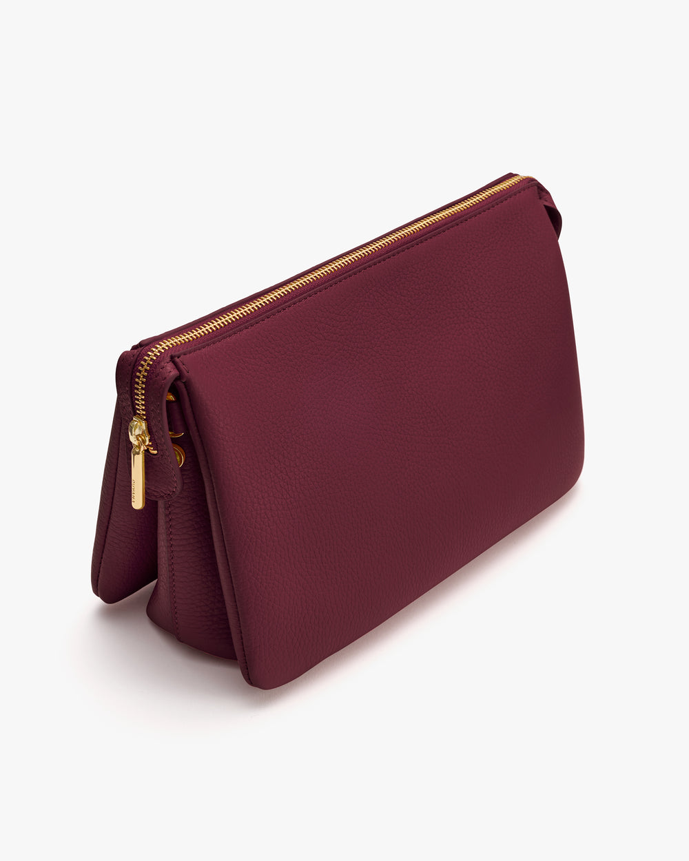 Rectangular purse with zipper on top edge.