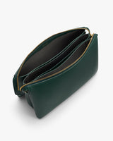 Open handbag with compartments and a zipper closure.
