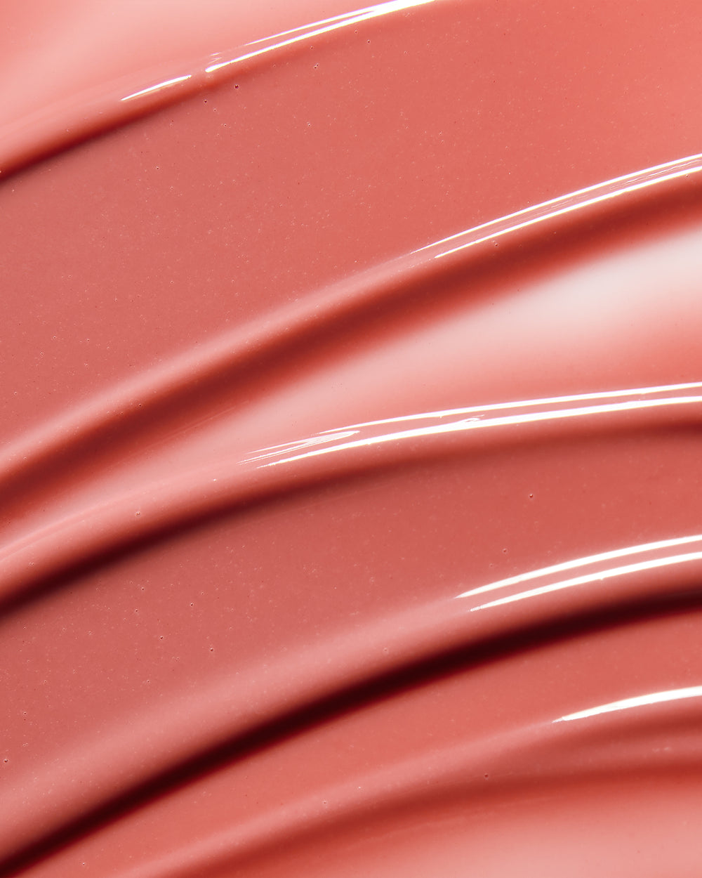 Abstract pattern with smooth, curved lines and ridges.