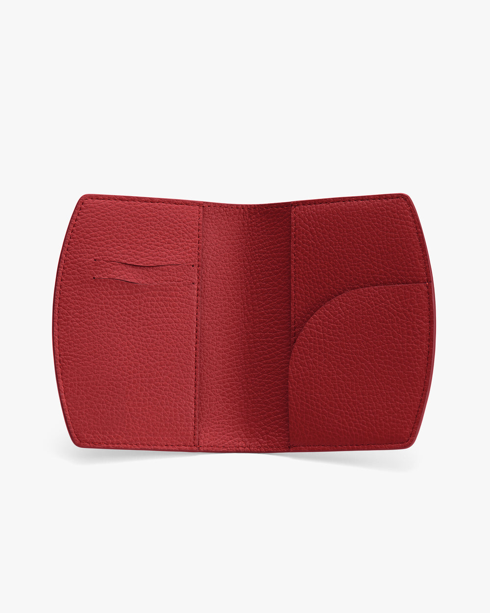 Open leather passport holder with multiple card slots.