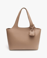 Tote bag with attached mini pouch and two handles.