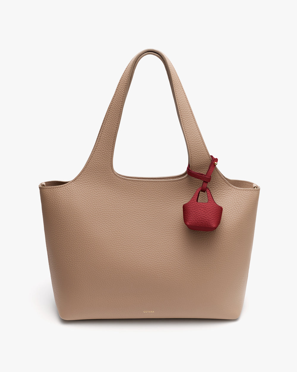 Tote bag with a small attached accessory.