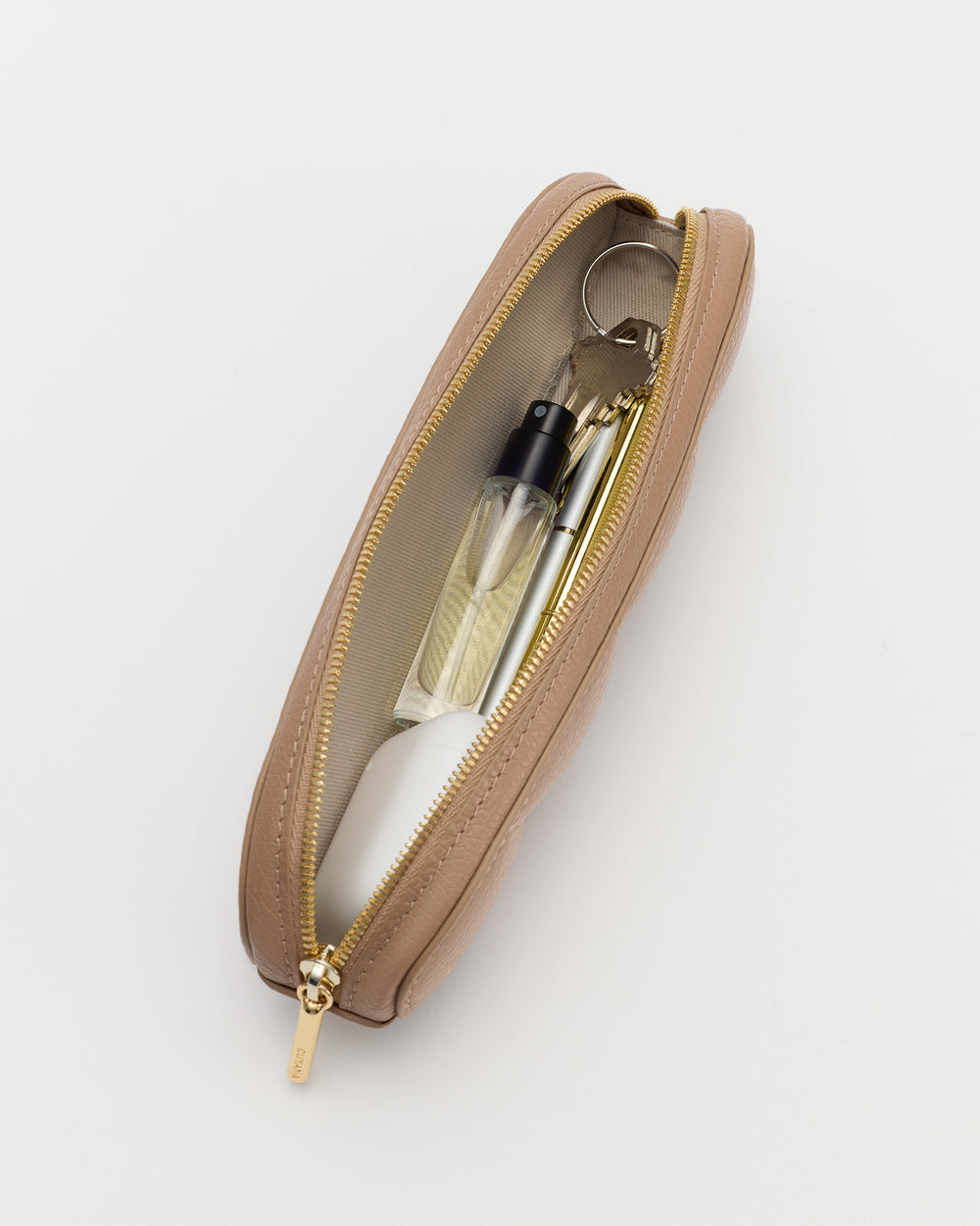 Small pouch with a zipper partially open showing contents inside including a spray bottle.