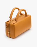 Rectangular handbag with two handles and a zip closure.