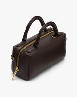 Rectangular handbag with two handles and a zipper on top