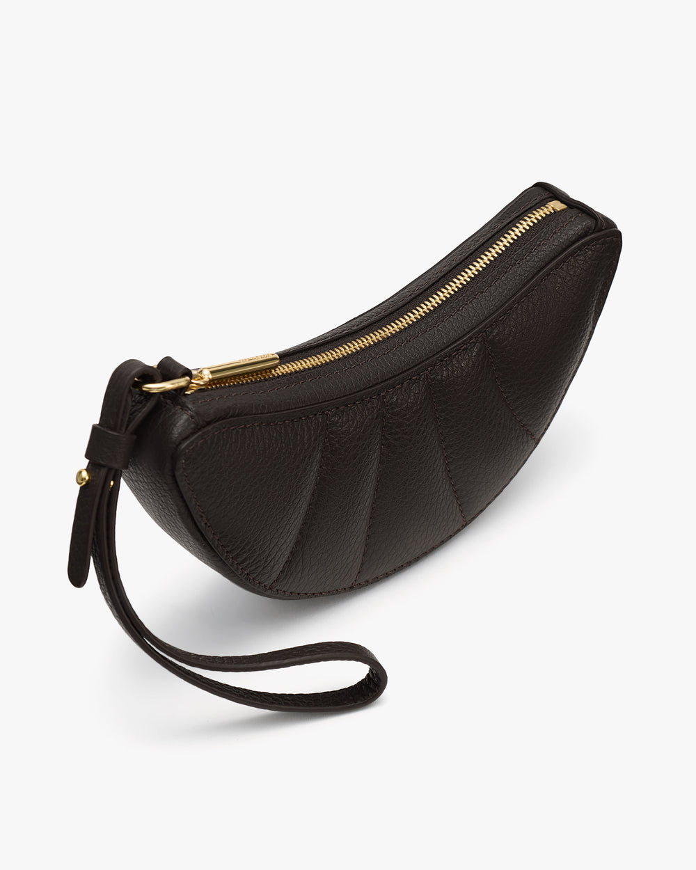 Curved clutch bag with a wrist strap and zipper closure.
