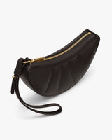 Curved clutch bag with a wrist strap and zipper closure.
