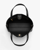 Open tote bag with long handles and a zippered pocket inside.
