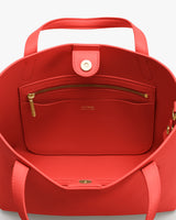 Open tote bag with a zipper pocket and handles