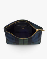 Open plaid zippered pouch with visible interior lining and label.
