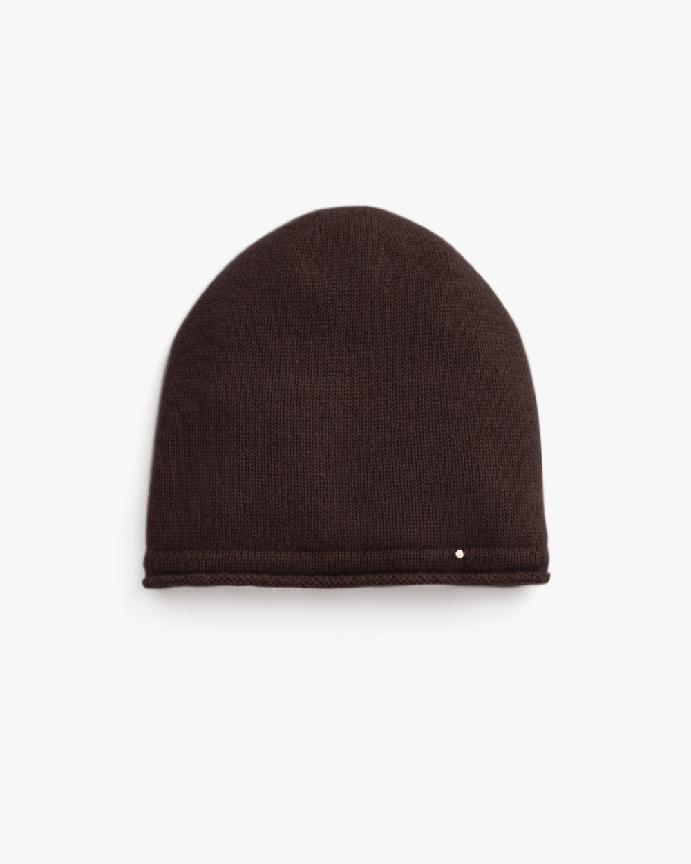 Knit beanie with a small emblem near the edge.