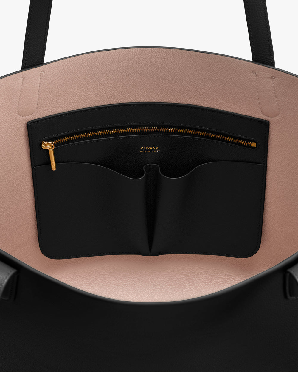 Open bag with pockets and a zipper inside.