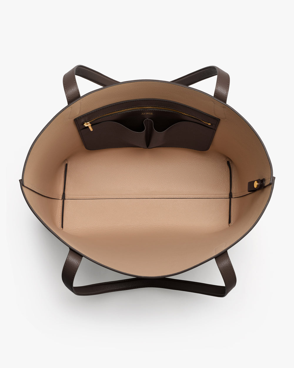 Open tote bag with pockets inside and handles on the sides.