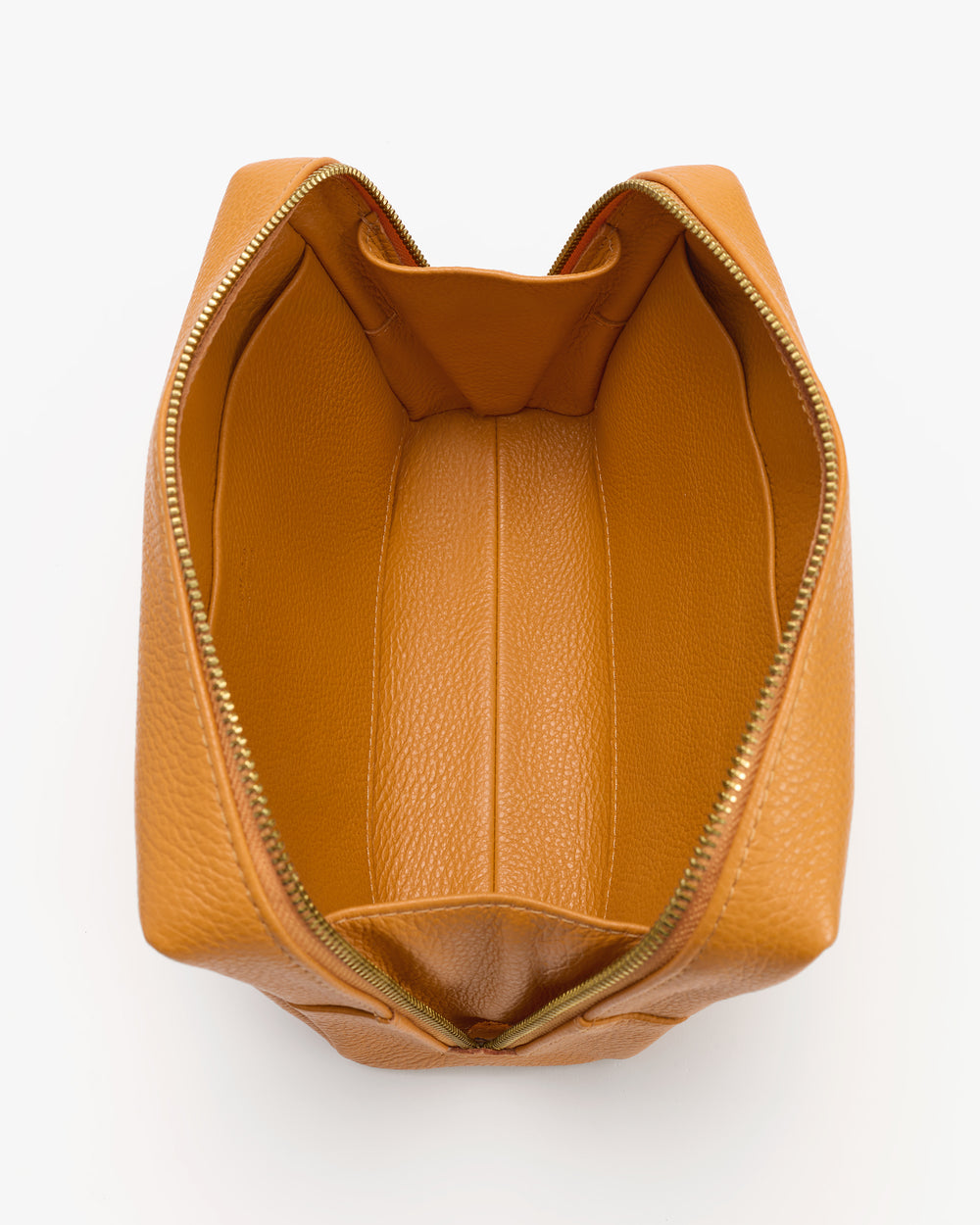 Open travel bag with a zipper viewed from above.