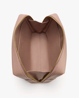 Open makeup bag with interior view and visible zipper edges