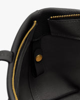 Bag interior with zipper and pocket detail.