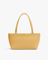 Tote bag with a textured design and two handles.