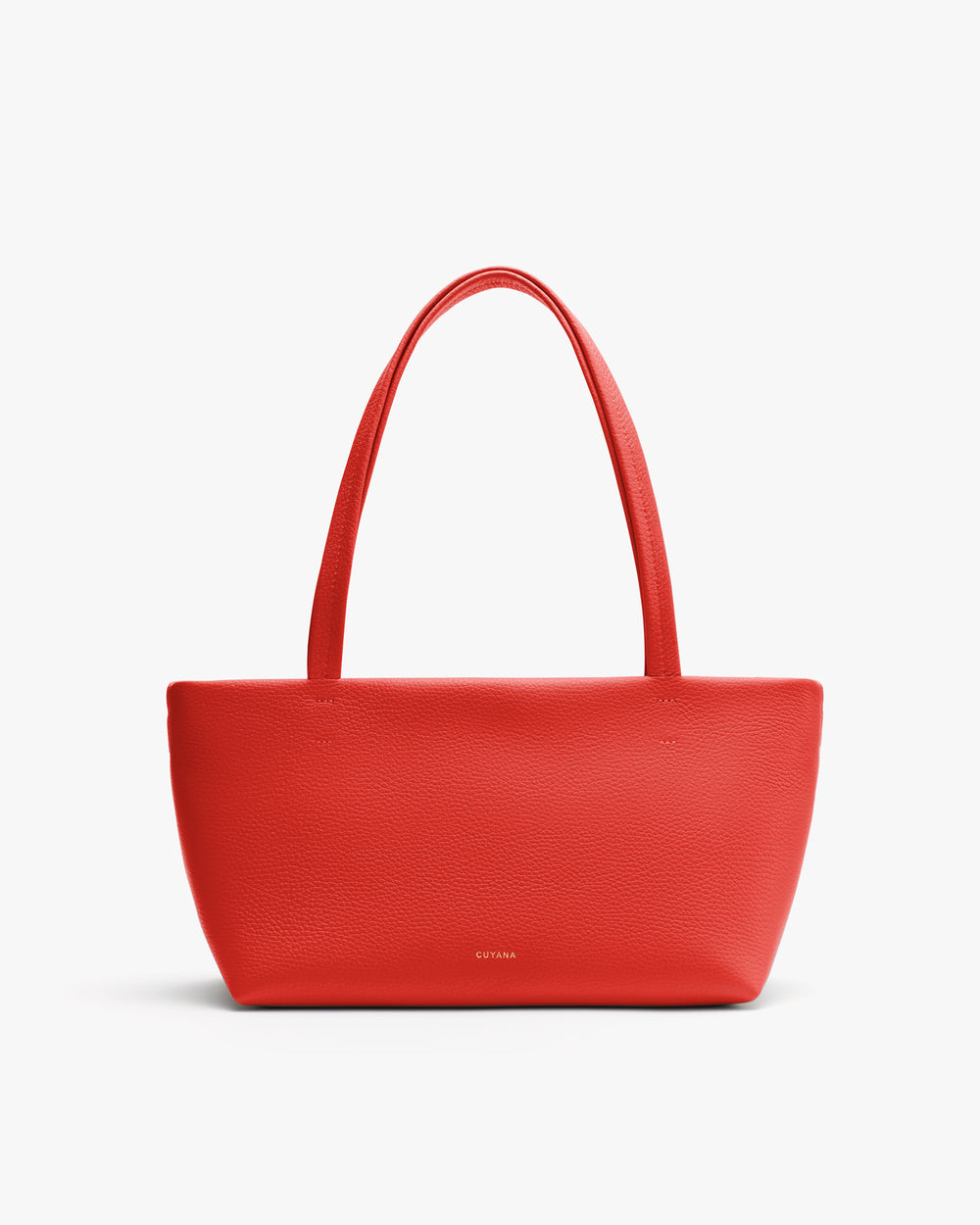 Tote bag with long handles and subtle embossed brand logo.