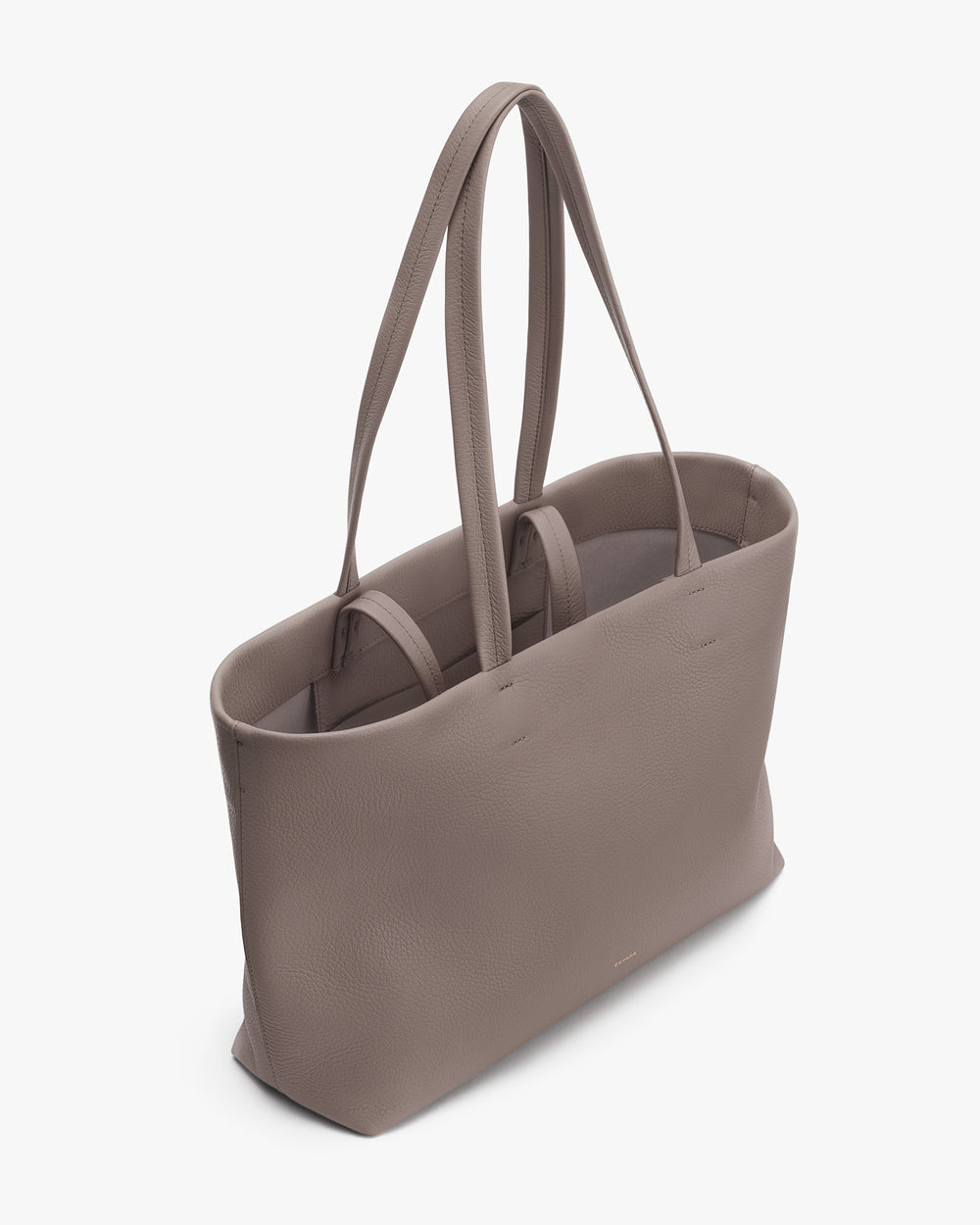 Tote bag with long handles shown from a side angle.
