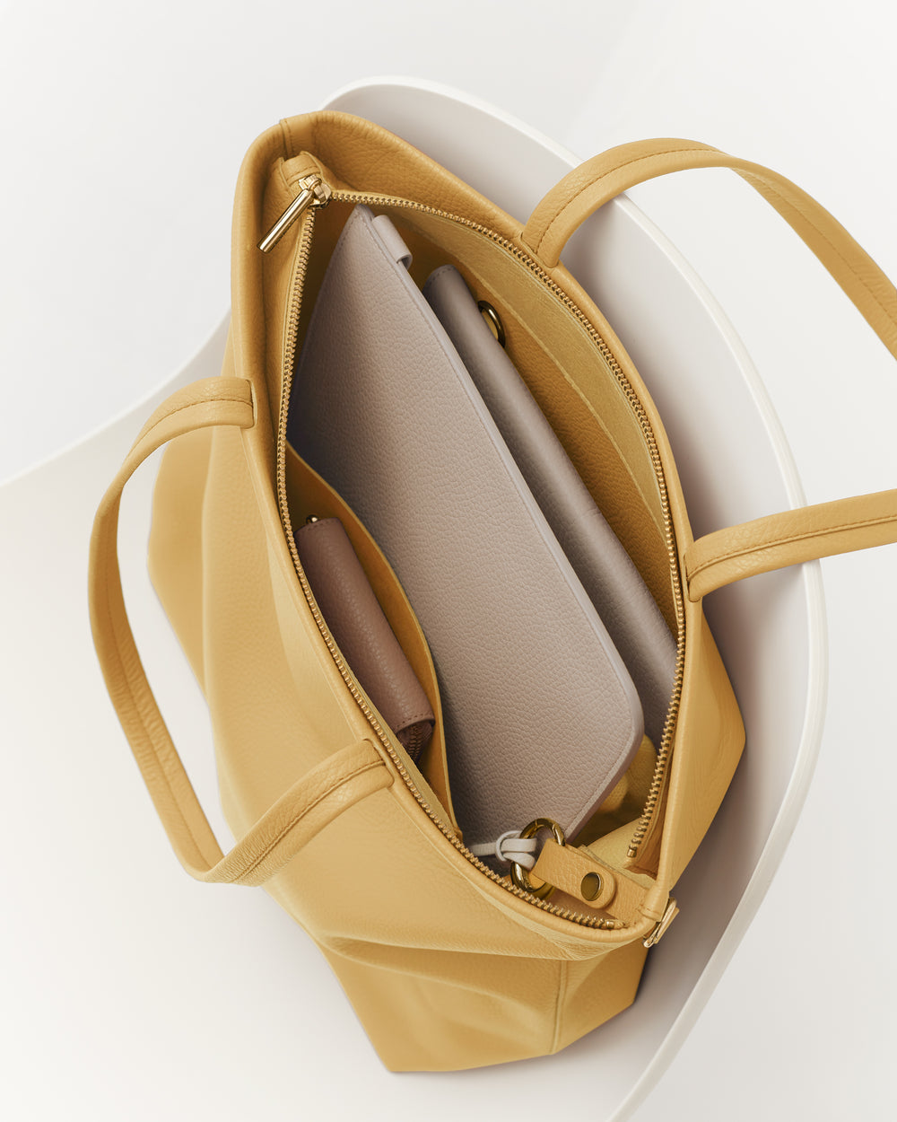 Open travel bag with organized contents inside.