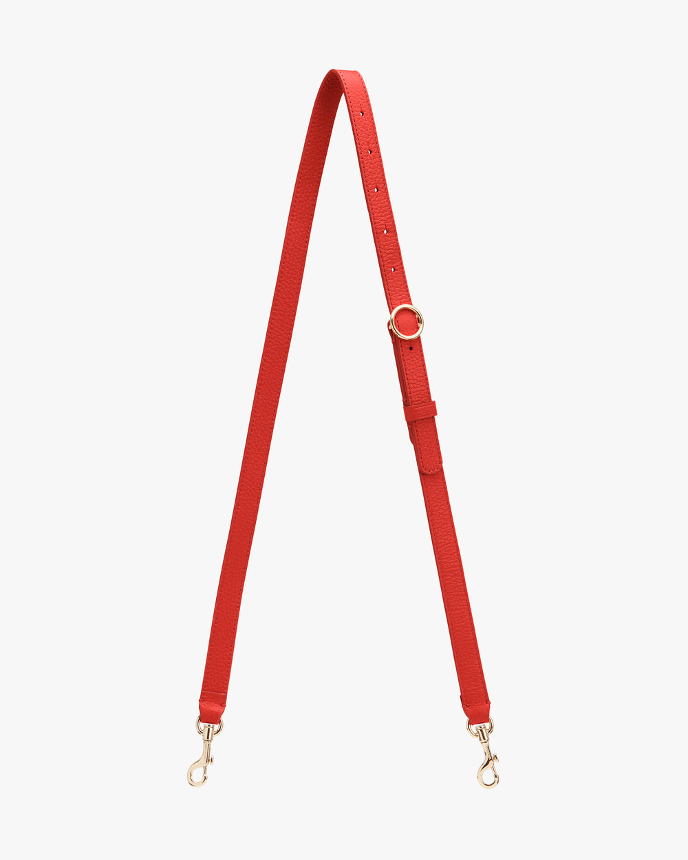 Long adjustable bag strap with gold hardware included clasps on both ends for attaching to a bag.