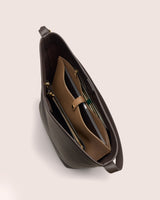 Open tote bag with inner compartments and zippers.