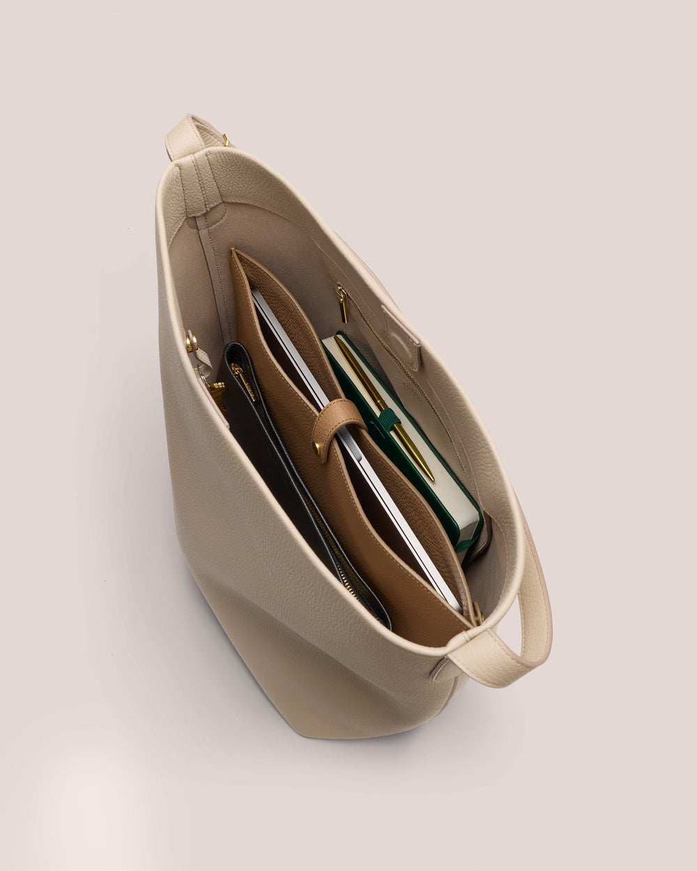 Open handbag with organized contents inside