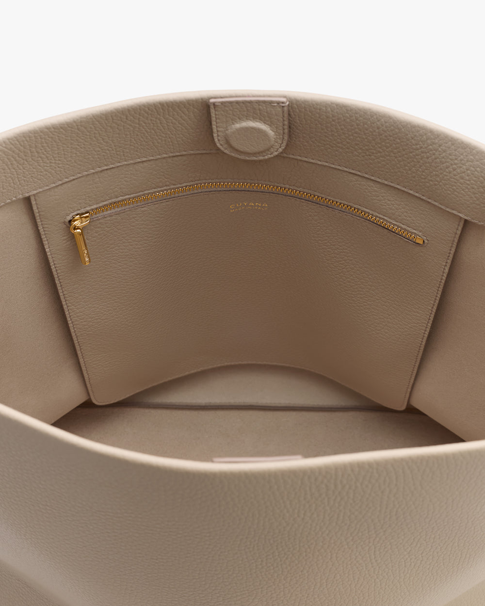 Inside view of a tote bag with a zippered pocket.