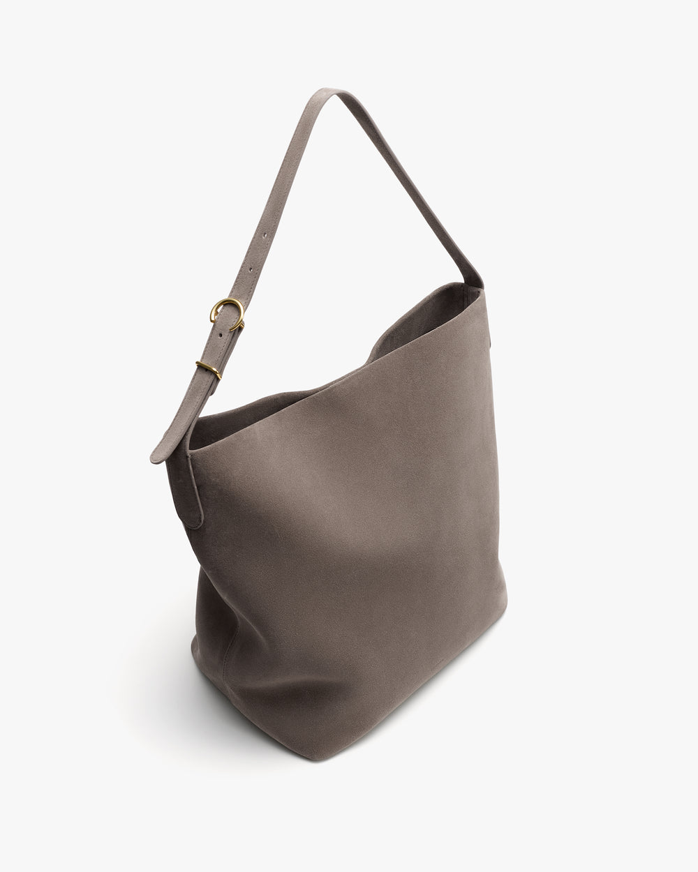 Shoulder bag with a single strap on a flat surface