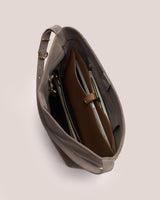 Open travel bag with organized contents inside.