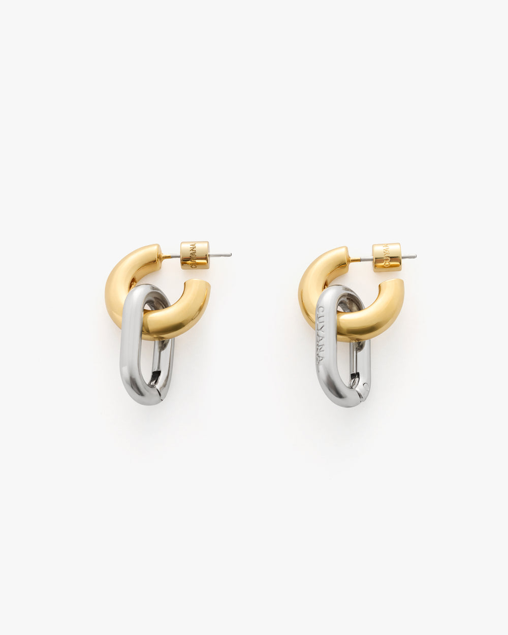 Two interlocking metal hoop earrings with a sleek finish.