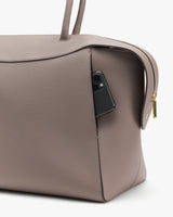 Tote bag with cellphone in side pocket