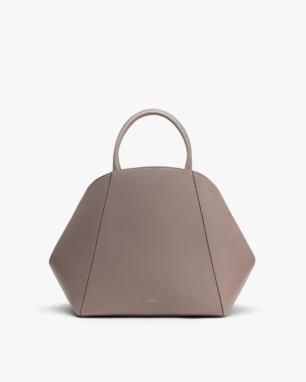 Geometric handbag with short handles on display.