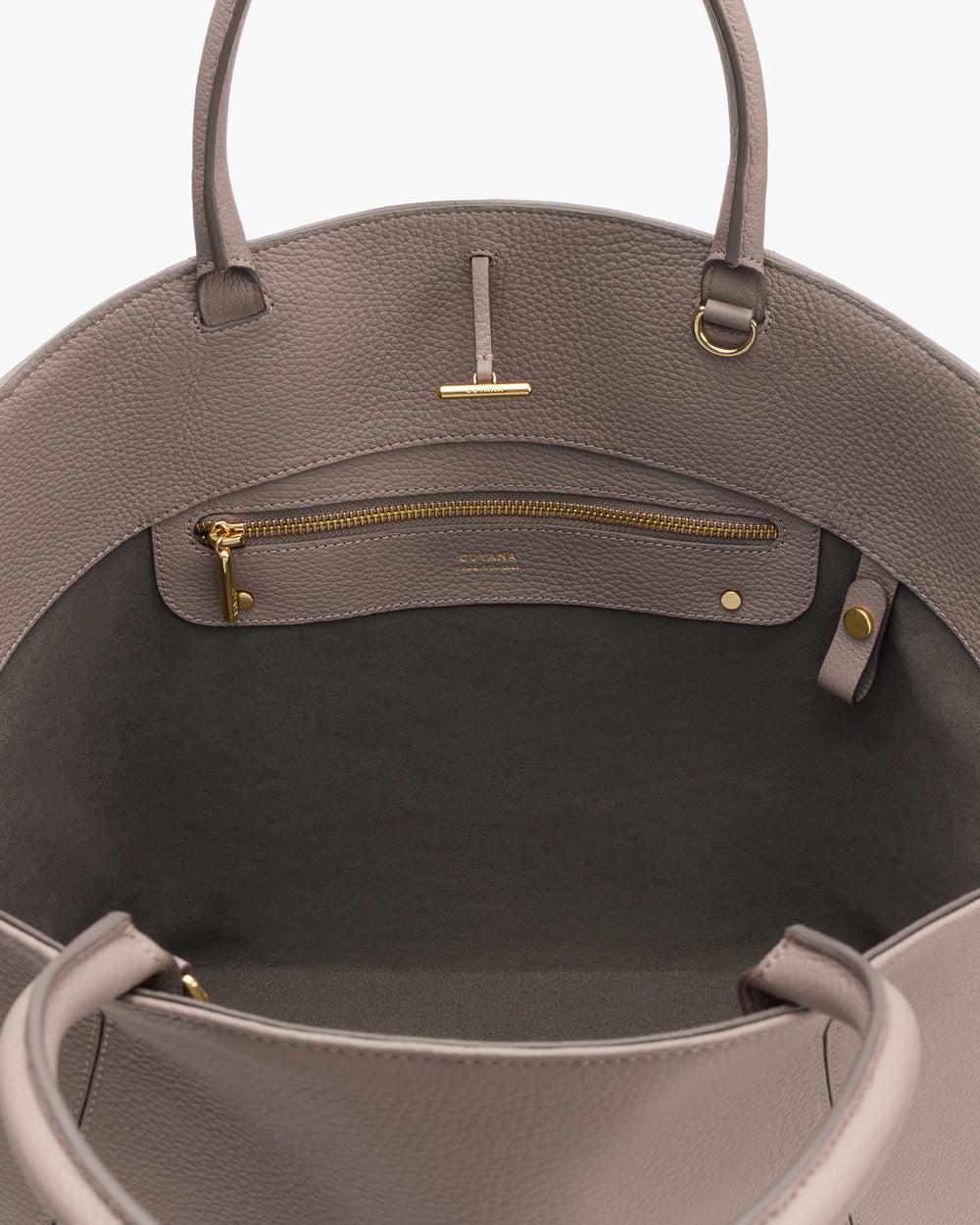 Open handbag with a zipper pocket inside.
