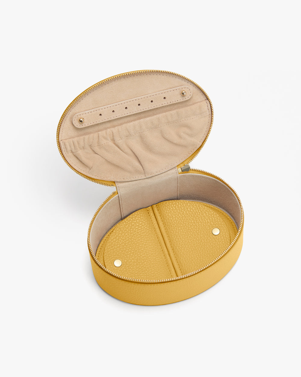 Round jewelry case with open lid and inner compartments.