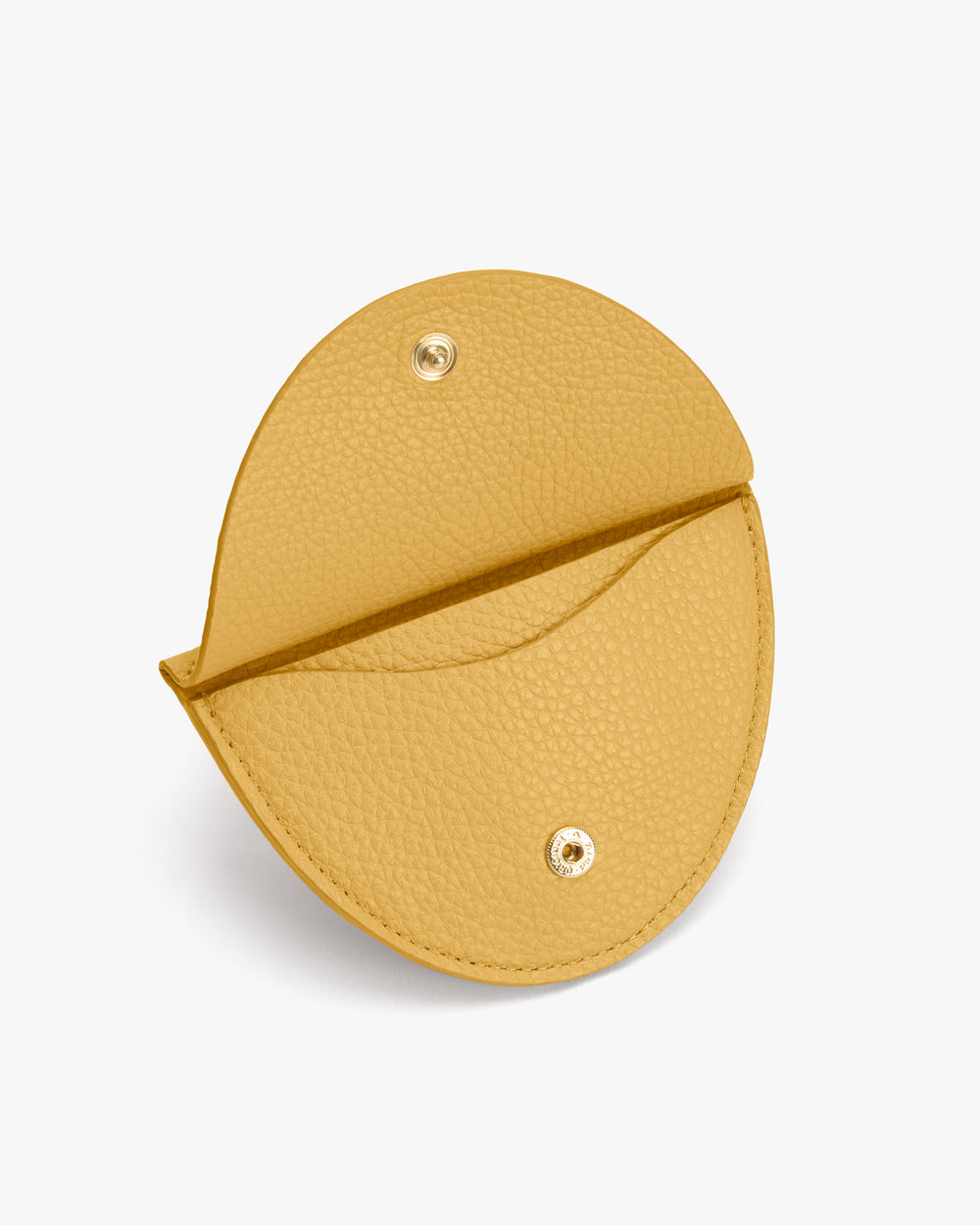 Round leather coin purse with snap button closure.