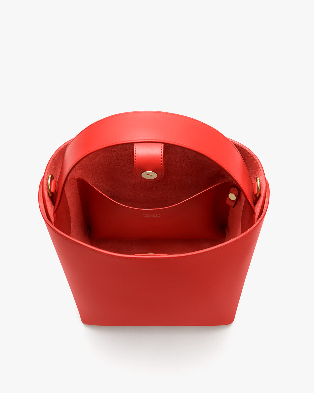 Open handbag with interior pocket and button closure visible.