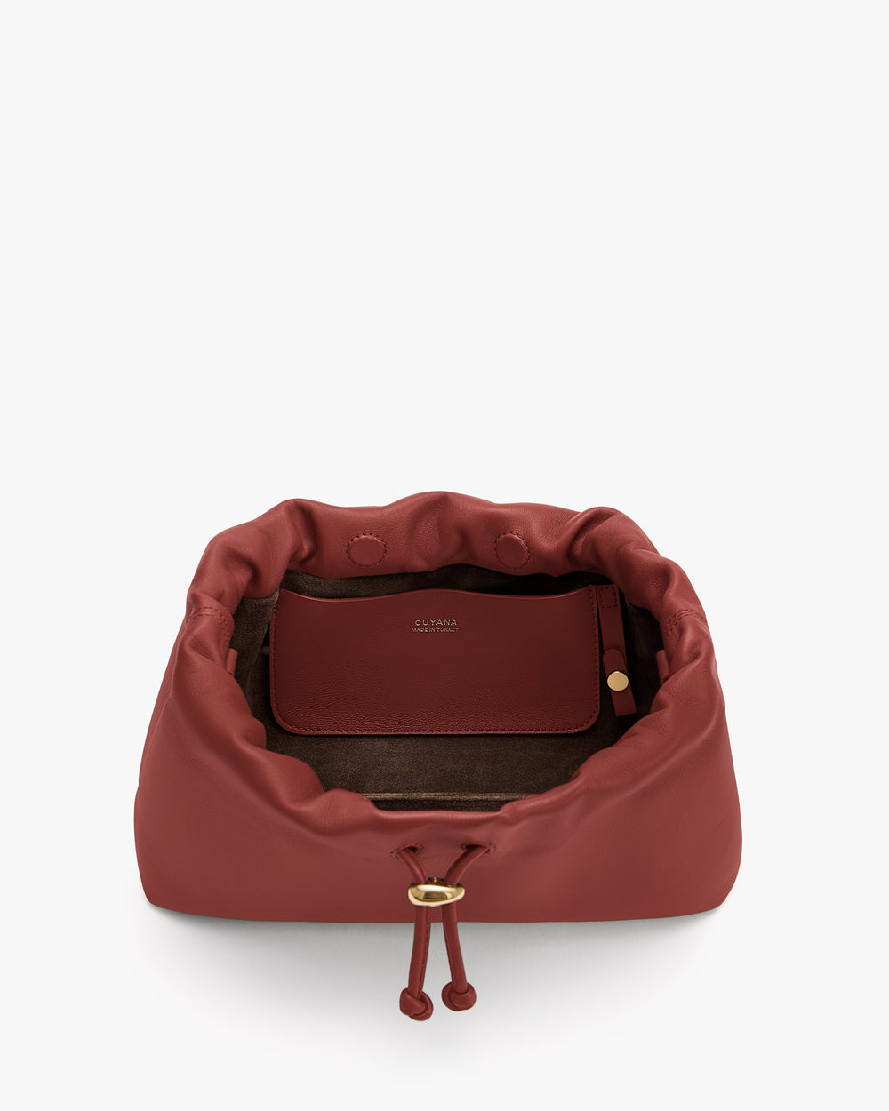Open drawstring bag with visible interior pouch and button details.
