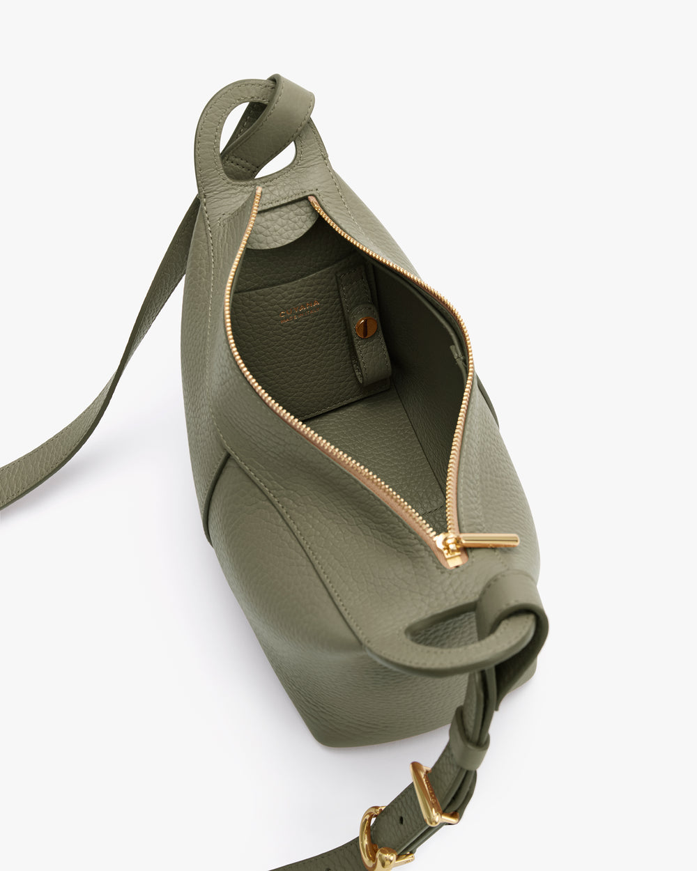 Open handbag with visible interior and zipper closure.