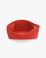 Open pouch with a visible zipper and inner pocket.